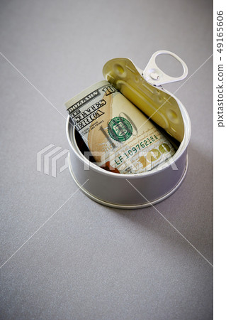 US dollar bills in cans US dollar bills in cans 49165606