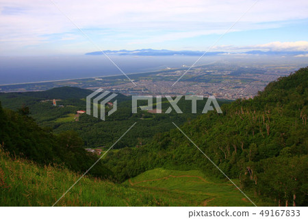 Ishikari Bay in the fog and Mt. 49167833