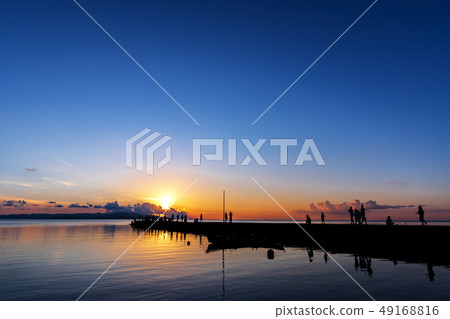 Sunset at Taketomijima west jetty 49168816