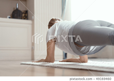 Yoga Classes at Home Beautiful Women Over 50 Years. Yoga Classes at Home Beautiful Women Over 50 Years. 49169460