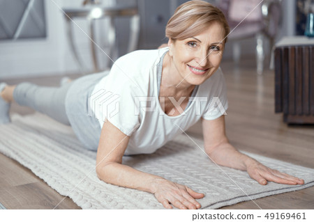 Yoga Classes at Home Beautiful Women Over 50 Years. Yoga Classes at Home Beautiful Women Over 50 Years. 49169461