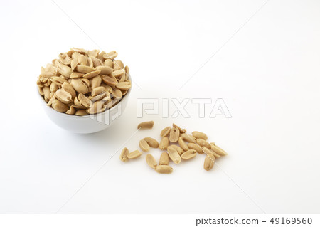 Roasted peanuts and salt in a bowl Roasted peanuts and salt in a bowl 49169560