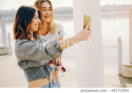 two girls in a summer park 49171904