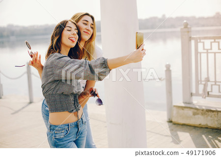 two girls in a summer park 49171906