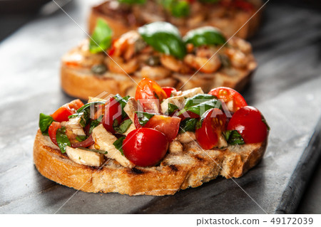 Traditional Italian bruschettas Traditional Italian bruschettas 49172039
