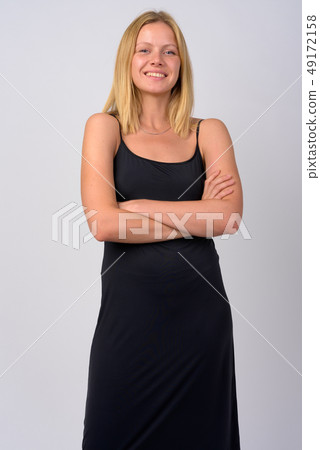 Portrait of happy young beautiful blonde woman with arms crossed 49172158