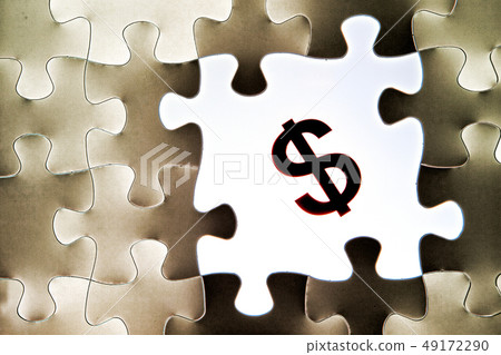 Jigsaw puzzle and dollar mark Jigsaw puzzle and dollar mark 49172290