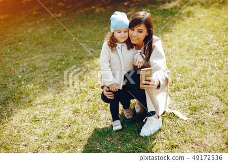 beautiful mother with her little daughter beautiful mother with her little daughter 49172536