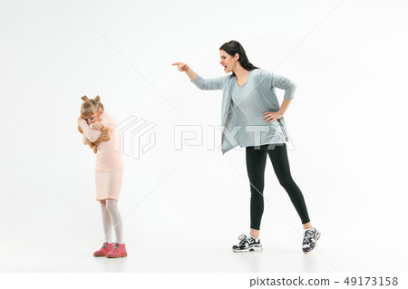 Angry mother scolding her daughter at home 49173158