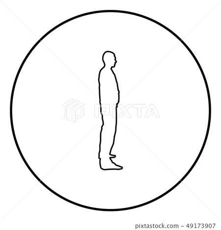 Man stands dressed in work clothes overalls and 49173907