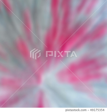 Abstract blurry image of red splash on a grey background Abstract blurry image of red splash on a grey background 49175354
