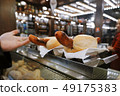 Grilled hot dogs on the counter. Close-up view. 49175383