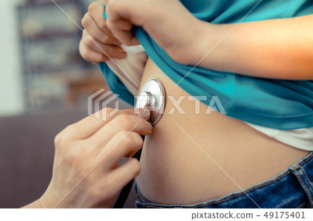 Close up of a professional stethoscope in use Close up of a professional stethoscope in use 49175401