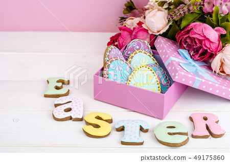 Colorful easter egg in gift box, cookies biscuits Colorful easter egg in gift box, cookies biscuits 49175860