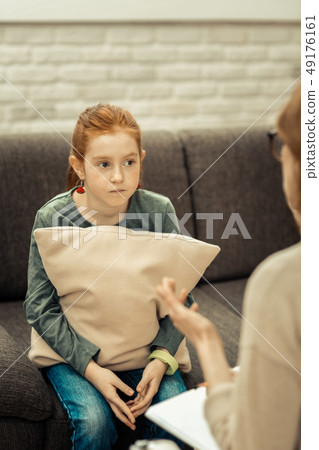 Nice red haired girl having a psychological session 49176161