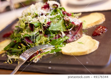 Fresh goat cheese salad on the Spanish restaurant Fresh goat cheese salad on the Spanish restaurant 49176344