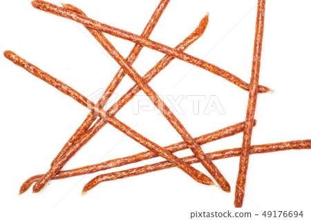 Spicy tyrolini salami stick isolated on white 49176694