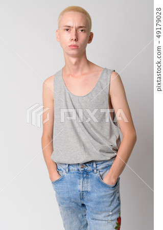 Portrait of young handsome androgynous man looking at camera 49179028