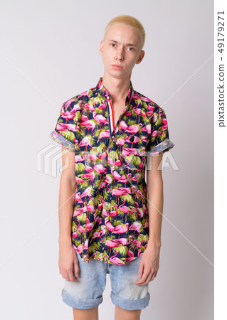 Portrait of young handsome androgynous tourist man 49179271