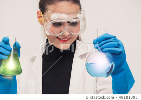 Woman scientist working in chemist laboratory. 49181393