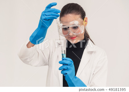 Woman scientist working in chemist laboratory. 49181395
