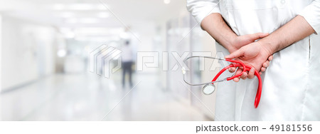 Young male doctor working at the hospital. 49181556