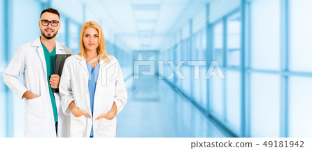 Doctors working with colleague in the hospital. Doctors working with colleague in the hospital. 49181942