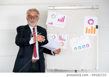 Manager give instruction in front of meeting room. Manager give instruction in front of meeting room. 49182133