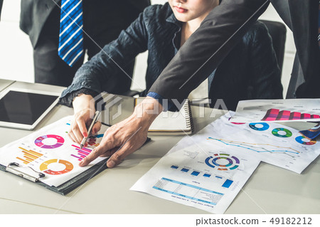 Business people working with business report. 49182212