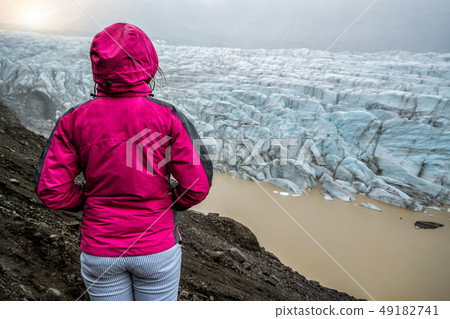 Traveler travel Svinafellsjokull Glacier, Iceland. 49182741
