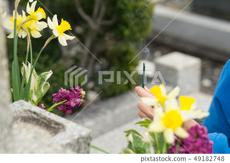 Go to the grave and give incense sticks Go to the grave and give incense sticks 49182748