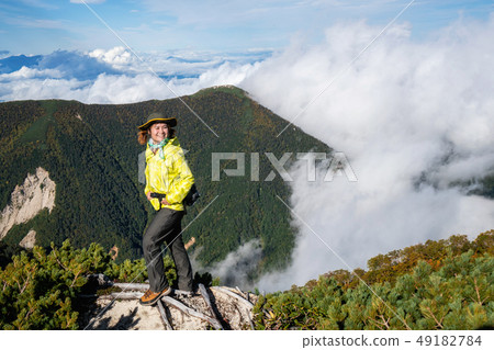 Hiker do trekking activity on mountain in Japan. Hiker do trekking activity on mountain in Japan. 49182784
