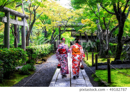 Traveler in Japanese Garden, Kyoto, Japan Traveler in Japanese Garden, Kyoto, Japan 49182787