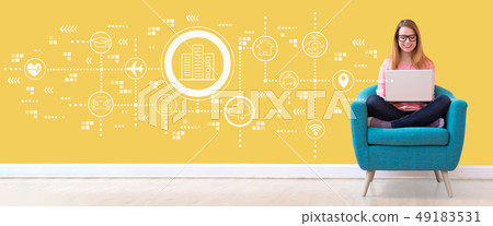Smart city concept with woman using a laptop Smart city concept with woman using a laptop 49183531