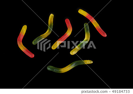 gummy jelly worm candy on a black background. 49184733