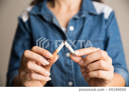 Soft focus of woman hand breaking 49189000