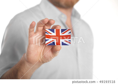 Businessman holding business card       49193518