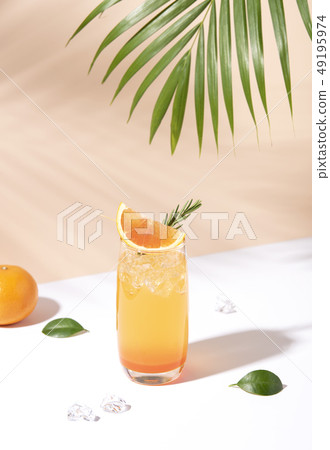 Cold and refreshing orange punch cocktail  49195974