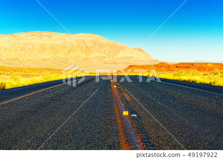 Endless American asphalt roads in Arizona state. Endless American asphalt roads in Arizona state. 49197922