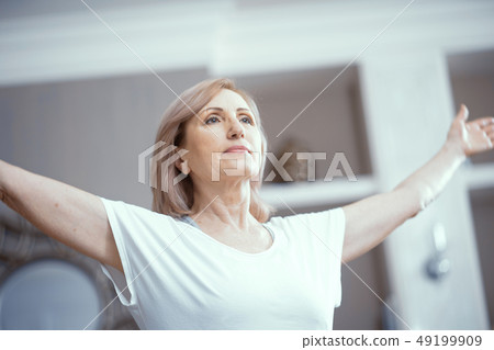 Woman doing yoga meditation Woman doing yoga meditation 49199909