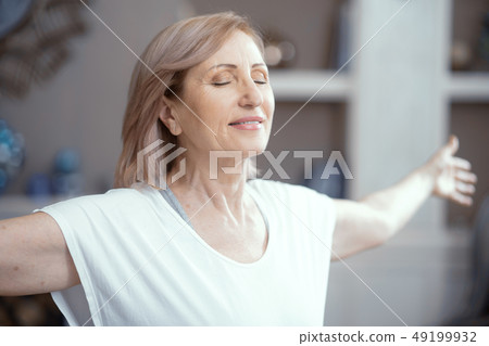Woman doing yoga meditation 49199932