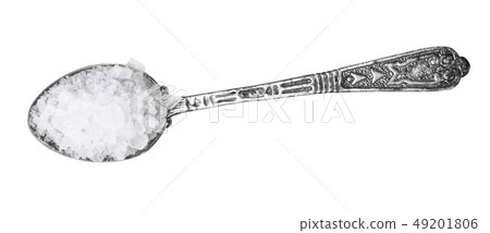 top view of silver salt spoon with coarse Sea Salt top view of silver salt spoon with coarse Sea Salt 49201806