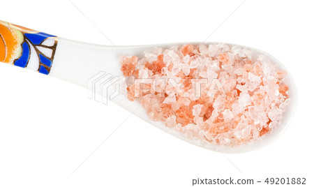 top view of chinese spoon with pink Salt close up top view of chinese spoon with pink Salt close up 49201882