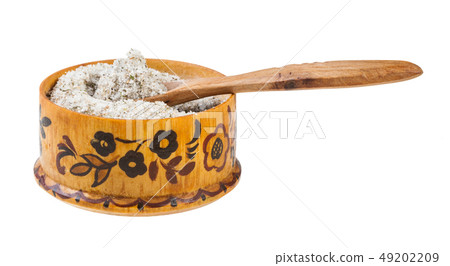 wooden salt cellar with spoon with seasoned salt 49202209