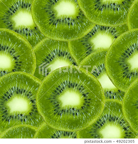 Seamless pattern with slices of fresh kiwi.  49202305