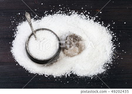 top view of silver salt cellar and rough Halite 49202435