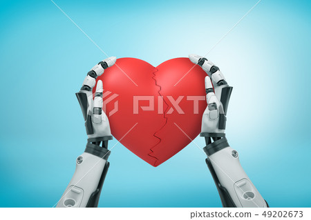 View from above of black and white robot hands holding big red Valentine heart cracked in half on View from above of black and white robot hands holding big red Valentine heart cracked in half on 49202673