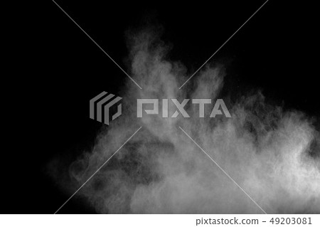 White powder explosion.Freeze motion of white dust White powder explosion.Freeze motion of white dust 49203081
