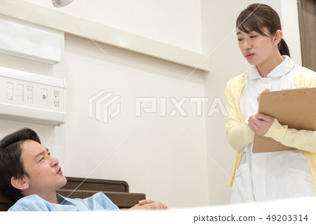 Patient and nurse 49203314