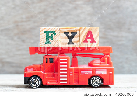 Red fire truck hold letter block in word FYA Red fire truck hold letter block in word FYA 49203806